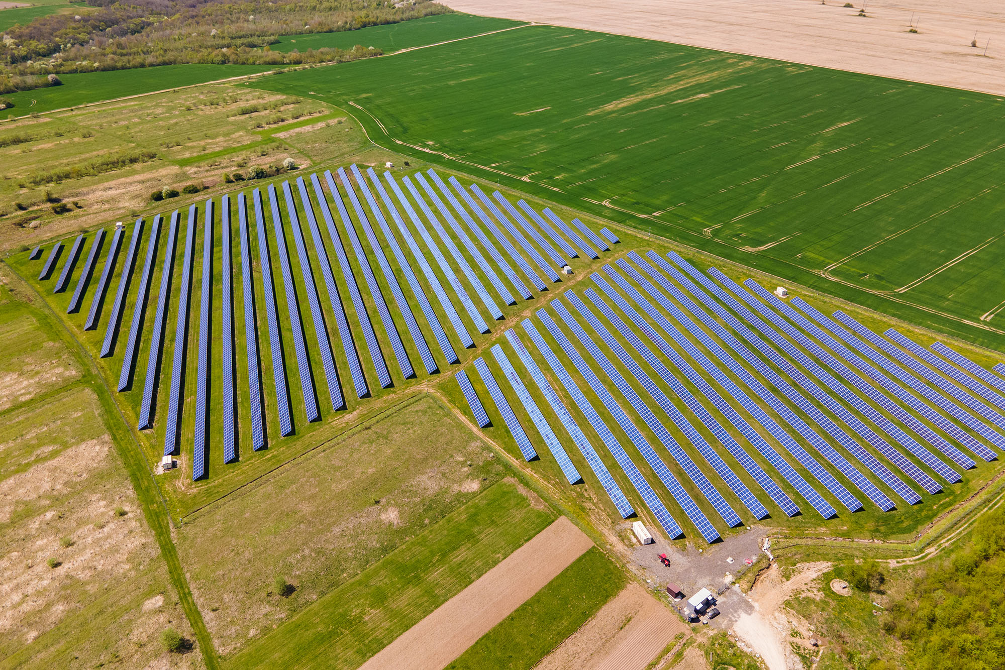 Aerial view of big sustainable electric power plant with many